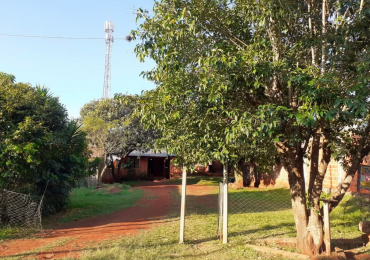 Terreno con casa precaria